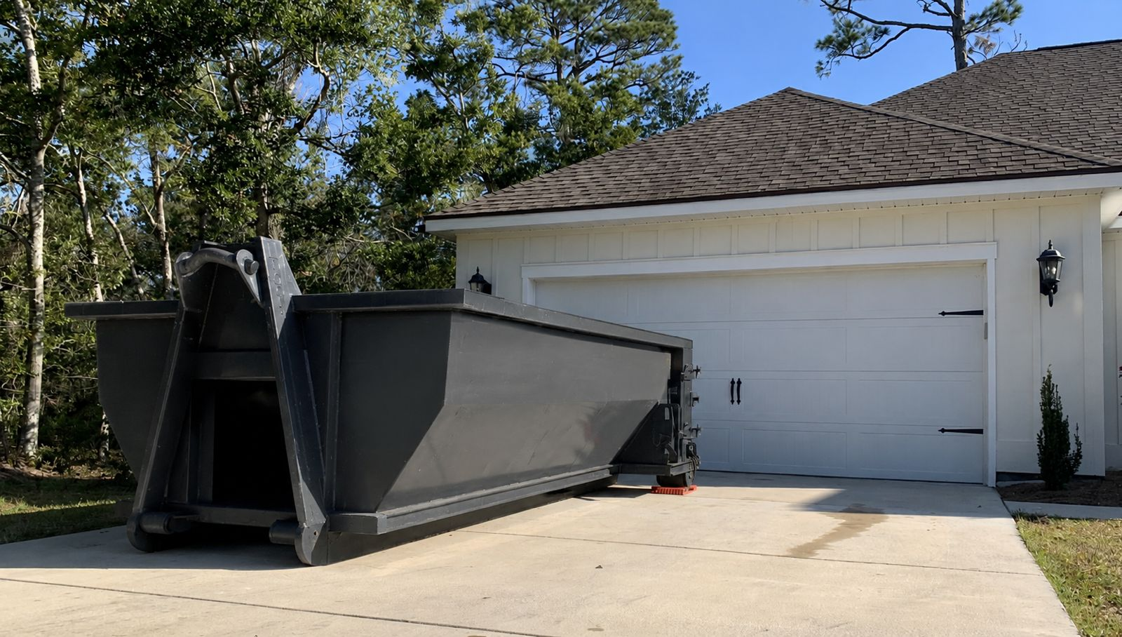 Roll-off dumpster at a Brandon home project